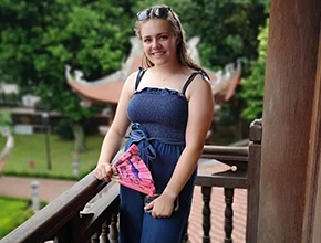 Jasmine Pugh standing on a balcony